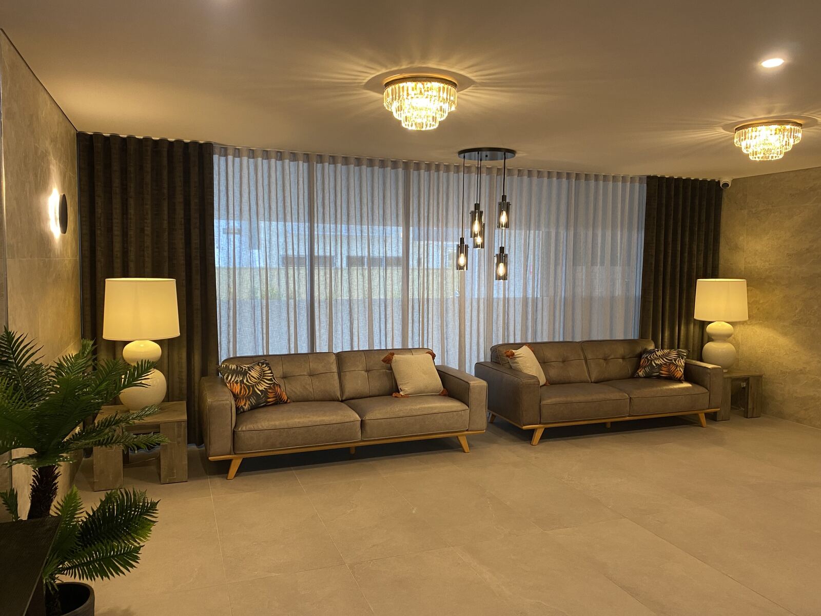 Custom sheer and blockout curtains installed in a Redlands living room